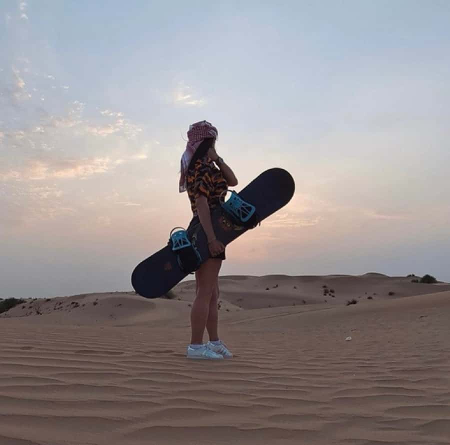Dubai: Polaris RZR and Sandboarding Desert Adventure - Hotel pickup, meeting point, and a transport warning
