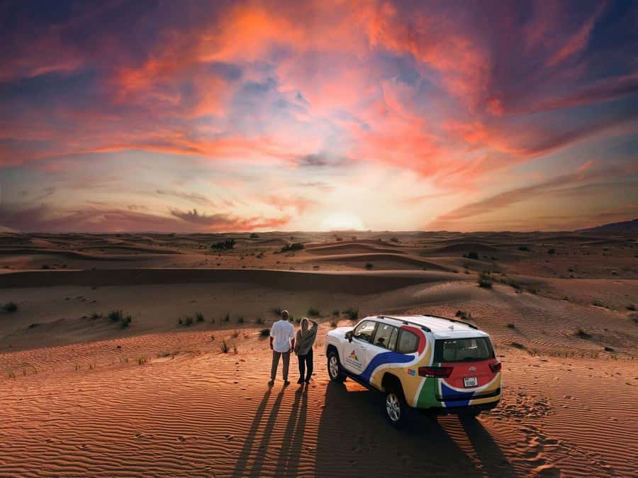 Dubai: Premium Desert Safari, Camel Ride, BBQ & Sandboarding - Dune bashing across the red sand