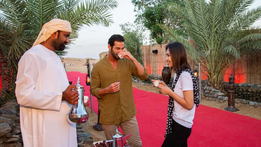 Dubai: Premium Desert Safari, Camel Ride, BBQ & Sandboarding - A three-course BBQ under the stars