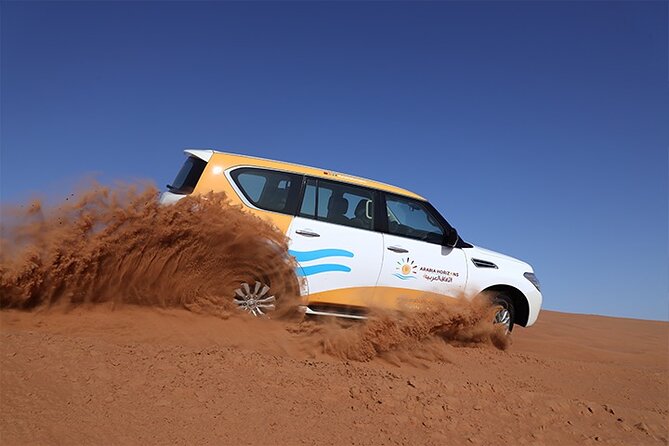 Dubai Premium Desert Safari with Live shows & Gourmet Dinner - Sand boarding, camels, and the falcon option