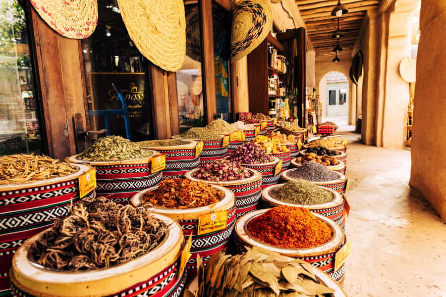 Dubai: Premium Old Town, Street Food, Souks & Boat Ride Tour - Walking through Al Fahidi’s preserved lanes