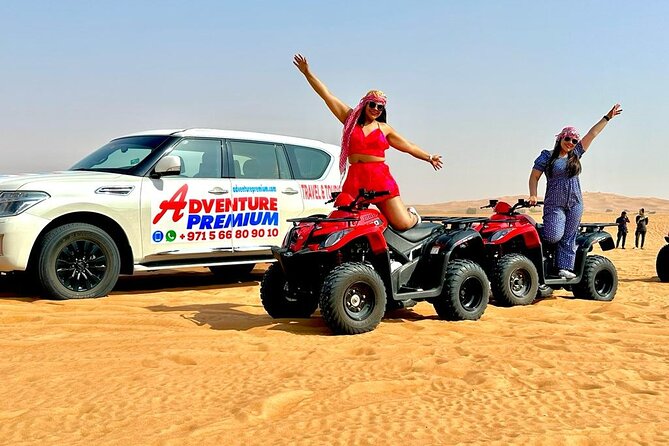 Dubai Premium Red Dunes, Quad Bike, Camel Ride, Sand Surfing & 5<em> BBQ – Key points before you book’ /></p>
<ul>
<li><strong>Lahbab’s red dunes:</strong> You travel beyond Dubai to a red-sand desert area known for taller, more dramatic dunes than the city’s nearby sand.</li>
<li><strong>Longer dune bashing:</strong> The 30 to 45 minute 4×4 ride is the heart of the day, not just a short loop for photographs.</li>
<li><strong>Quad biking with a guide:</strong> The ATVs are operated as a guided activity, giving first-time riders a more structured introduction.</li>
<li><strong>A full evening camp:</strong> Expect camel rides, sandboarding, henna, shisha, tea, coffee, dates, sweets, dinner, and stage entertainment.</li>
<li><strong>Good driver service can make the day:</strong> Mohammad is praised for patience, clear explanations, and photography, while other reports describe weak communication and delays.</li>
<li><strong>Value comes with tradeoffs:</strong> At $59 per person, the package includes transport and many activities, but the busy setting may feel less personal.</li>
</ul>
<h2>The ride from Dubai to Lahbab</h2>
<p> BBQ – The ride from Dubai to Lahbab’ /></p>
<p><p>Pickup begins around 2:30 pm, with collection from anywhere in Dubai. The drive to Lahbab takes roughly 45 to 60 minutes, depending on your starting point and traffic. That transfer is useful because Lahbab is not a casual walk or short taxi ride from the city.</p>
</p>
<p><p>You ride in a 4×4 and can expect the vehicle to stop before the main dune run so the tires can be deflated. This is standard desert-safari preparation, allowing the vehicle to handle soft sand more effectively. The pause also gives you a chance to stretch, take photographs, and see the red color of the dunes before the faster part begins.</p>
</p>
<p><p>The shared-tour format matters here. A maximum of 150 people means your 4×4 may be part of a larger convoy, and the schedule can feel more like a coordinated outing than a private desert trip. If you want quiet and flexible timing, this may feel crowded. If you want a simple package at a moderate price, the group format keeps the cost down.</p>
</p>
<p><p>Pickup reliability is the biggest practical concern. Several poor experiences involved a late or absent vehicle, including cases where the operator cited a broken-down car without arranging a clear alternative. Confirm your pickup the day before, then keep your phone available at the stated time. This is not a criticism of every departure, but it is a sensible precaution for an activity that starts with transportation.</p>
</p>
<div class="twil" style="margin: 20px 0; padding: 15px 0;"><p>Other camel rides people book around Dubai:</p><ul style="margin: 10px 0; padding-left: 0; list-style: none;"><li style="margin: 0 0 12px 0; padding: 0 0 12px 0; border-bottom: 1px solid #E4E3F0; line-height: 1.4;"><a href="https://emiratestourreviews.com/dubai-desert-safari-quad-bike-camel-ride-al-khayma-camp/">Dubai: Desert Safari, Quad Bike, Camel Ride & Al Khayma Camp</a><br><span style="font-size: 0.82em; color: #555;"><span style="color: #B07400;">★</span> 4.9 &nbsp;&middot;&nbsp; 68,962 reviews</span></li><li style="margin: 0 0 12px 0; padding: 0 0 12px 0; border-bottom: 1px solid #E4E3F0; line-height: 1.4;"><a href="https://emiratestourreviews.com/dubai-desert-safari-quad-bike-camel-ride-and-sandboarding/">Dubai: Desert Safari, Quad Bike, Camel Ride and Sandboarding</a><br><span style="font-size: 0.82em; color: #555;"><span style="color: #B07400;">★</span> 4.9 &nbsp;&middot;&nbsp; 43,505 reviews</span></li><li style="margin: 0; padding: 0; border-bottom: none; line-height: 1.4;"><a href="https://emiratestourreviews.com/dubai-safari-quad-bike-camel-ride-and-buffet-dinner/">Dubai: Safari, Quad Bike, Camel Ride, and Buffet Dinner</a><br><span style="font-size: 0.82em; color: #555;"><span style="color: #B07400;">★</span> 4.9 &nbsp;&middot;&nbsp; 33,424 reviews</span></li></ul></div><h2>Red dunes and the main 4×4 run</h2>
<p><img width="669" height="446" decoding="async" src=