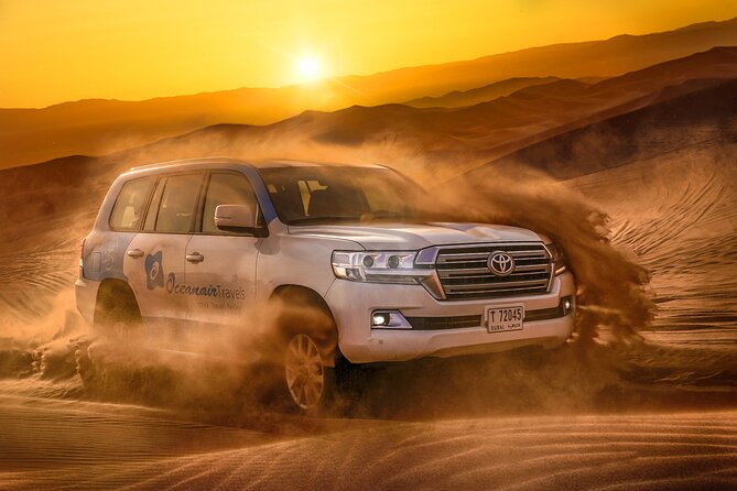 Dubai Premium Red Dunes Safari, Camels & 5<em> BBQ at Al Khayma camp – Key points to know before booking’ /></p>
<ul>
<li><strong>Lahbab’s red dunes provide the main thrill:</strong> Expect 30 to 45 minutes of 4WD dune bashing, plus a sandboarding stop and sunset photographs.</li>
<li><strong>Al Khayma Camp fills the second half of the day:</strong> Camel rides, falcon portraits, henna, Arabic clothing, shisha, dinner, dance shows, and stargazing are included.</li>
<li><strong>The advertised price is strong value:</strong> At $75 per person, transport, sports, food, drinks, and entertainment are bundled together. Quad biking costs extra.</li>
<li><strong>The safari is shared, not private:</strong> The maximum group size is six people, but you should still expect to share the 4WD and camp space.</li>
<li><strong>Timing changes the program:</strong> Evening departures include the fire show and telescope stargazing. The 11:30 AM departure includes lunch instead, without those night activities.</li>
<li><strong>Prepare for the desert:</strong> Eat two or three hours beforehand, wear sports shoes for sandboarding, bring a jacket in winter, and keep your phone available for pickup updates.</li>
</ul>
<h2>Why Lahbab is worth the extra drive</h2>
<p><img width="669" height="446" decoding="async" src=