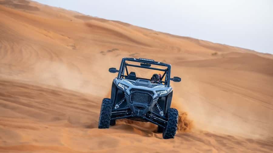 Dubai: Private Dune Buggy, Camel Ride, and Sand Boarding! - Safety gear and the Polaris buggy