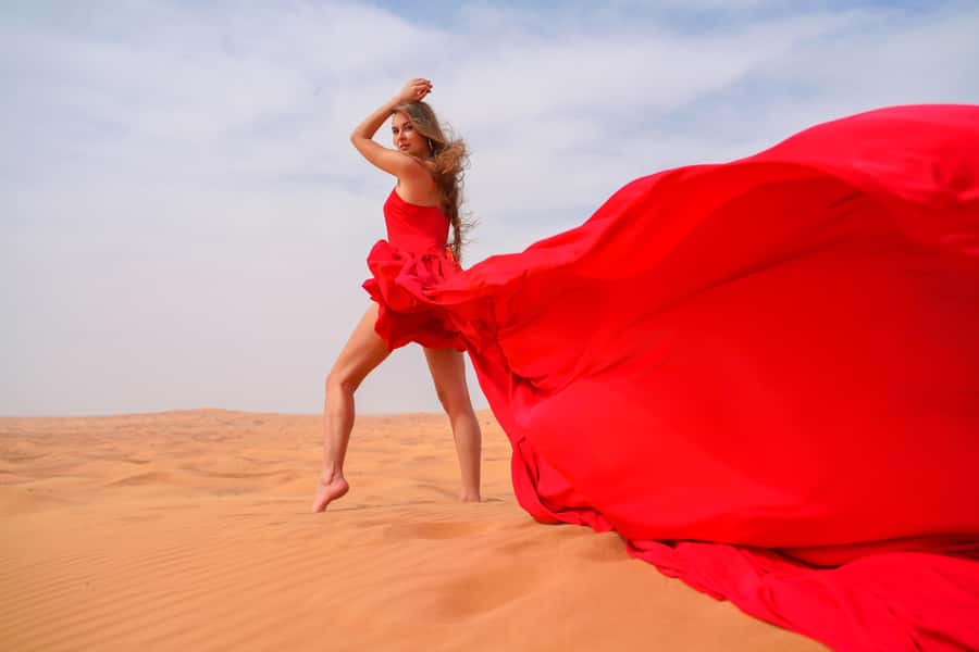 Dubai: Private Flying Dress Photography and Dune Drive Trip - A desert photo shoot, not a standard safari