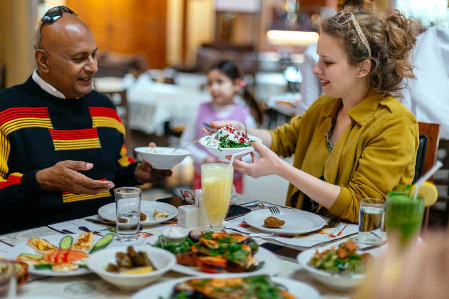 Dubai: Private Food Tour – 10 Tastings with Locals - Ten tastings, from dates and falafel to local drinks