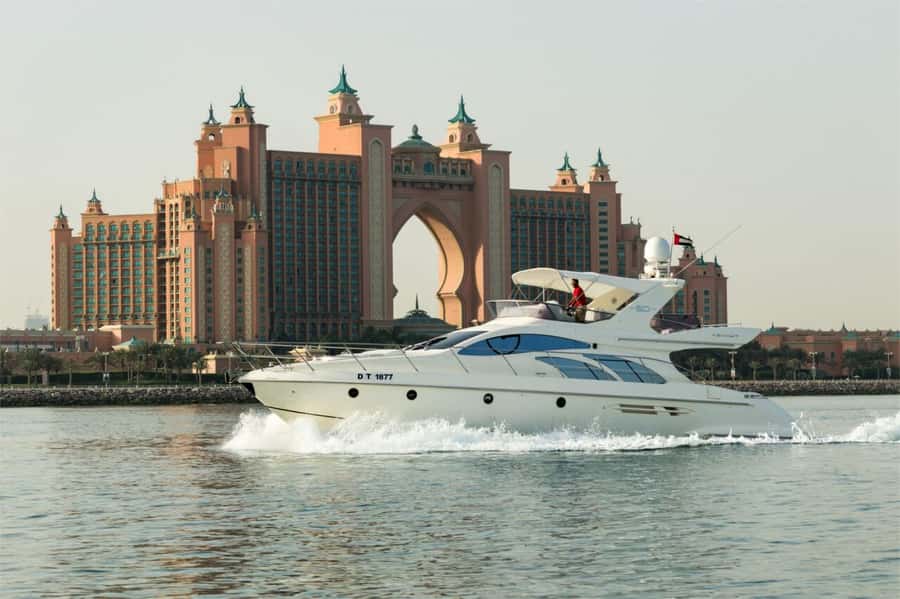 Dubai: Private Luxury Yacht Cruise for up to 20 People - The Palm Jumeirah route and its long line of resorts
