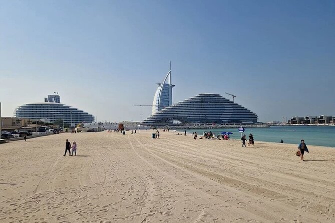 Dubai Private Premium Full-Day Sightseeing Tour with Burj Khalifa - Jumeirah brings beaches, sail shapes, and waterways
