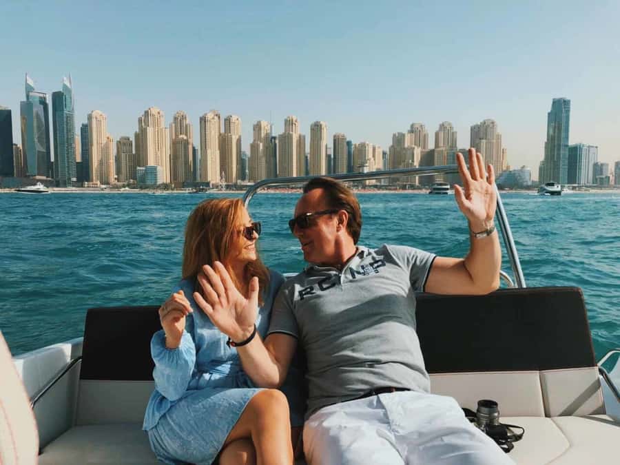 Dubai: Private Sea Escape Cruise - Swim, Tan & Sightsee - A private boat with your own music