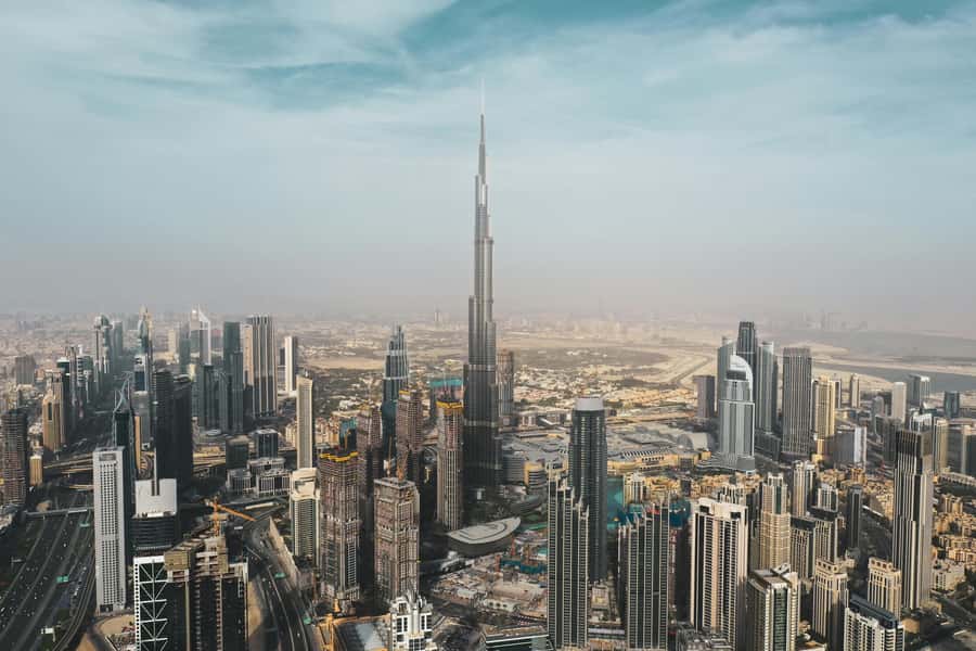 Dubai: Private Stopover City Tour with Burj Khalifa Ticket - Meeting your guide at Dubai International Airport