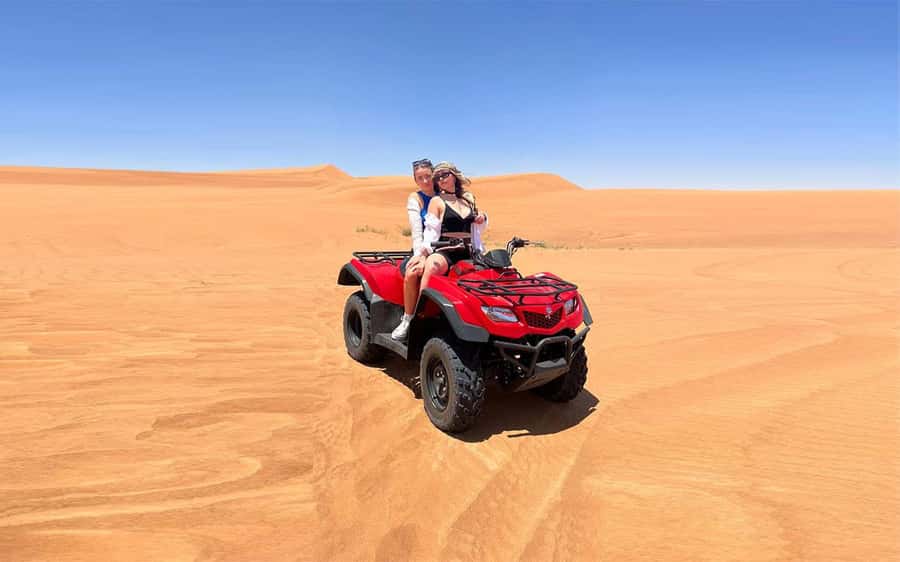 Dubai: Quad Bike, Dune Buggy, and Sandboarding Experience - Key points at a glance