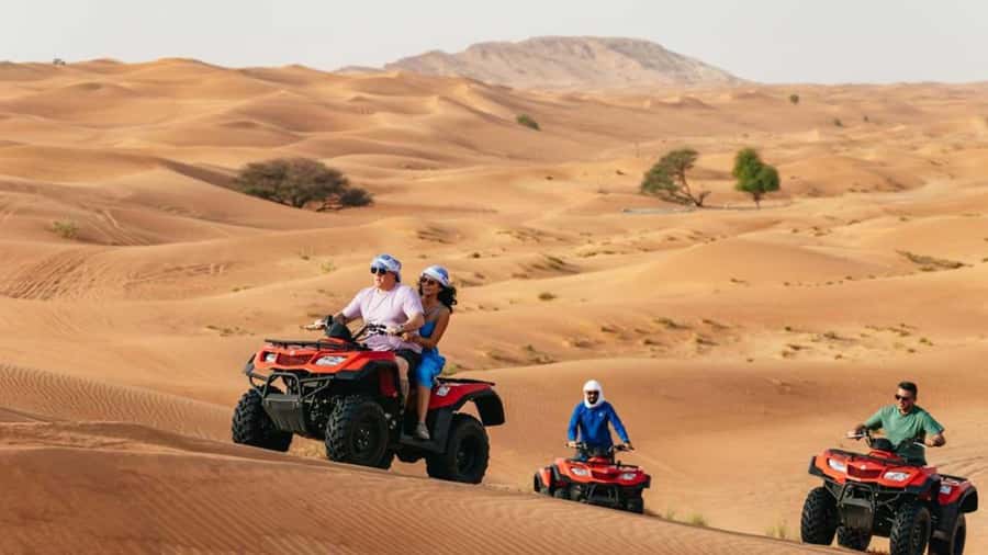 Dubai: Quad Bike, Dune Buggy, and Sandboarding Experience - Dune buggy power for a bigger thrill