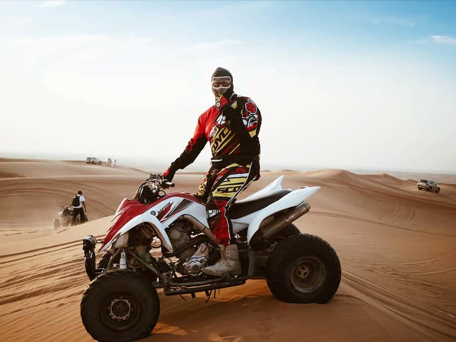 Dubai: Quad Bike or Dune Buggy Adventure & Optional Transfer - Red dunes and real driving time at Lehbab