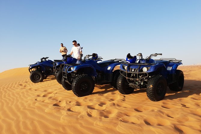 Dubai: Quad Bike Safari, Camels, & Camp with BBQ Dinner - Sunset at the Bedouin-style camp