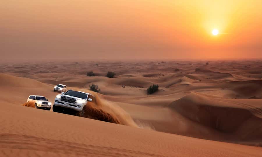 Dubai: Red Dune Desert Safari, Quad Bike, Camels, and BBQ - Choosing between the short and seven-hour options