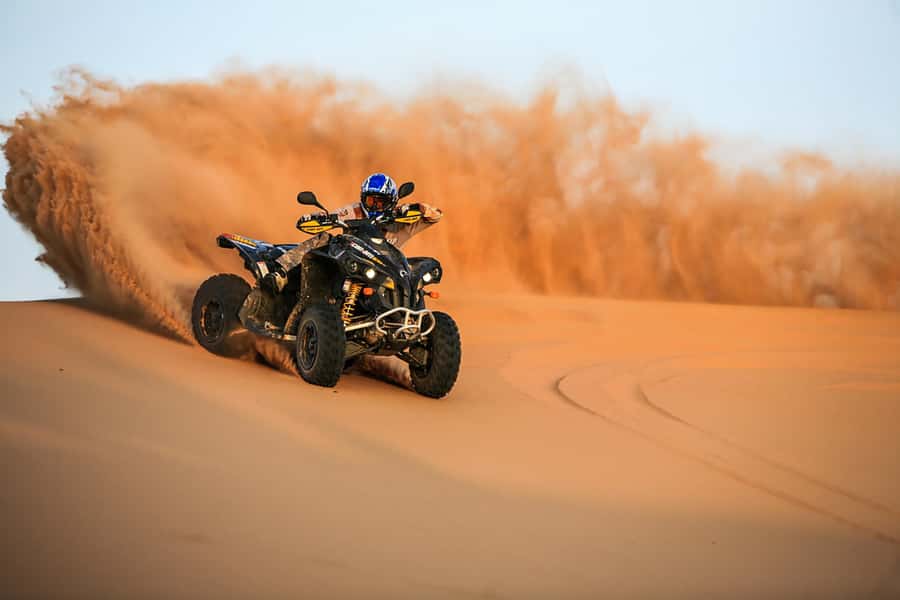 Dubai: Red Dune Safari, Quad Bike, Camel Ride, BBQ Dinner - Leaving Dubai for the red dunes