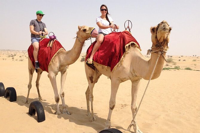 Dubai Red Dune Safari with BBQ Dinner and Live Shows - Dune bashing across Dubai’s red sand