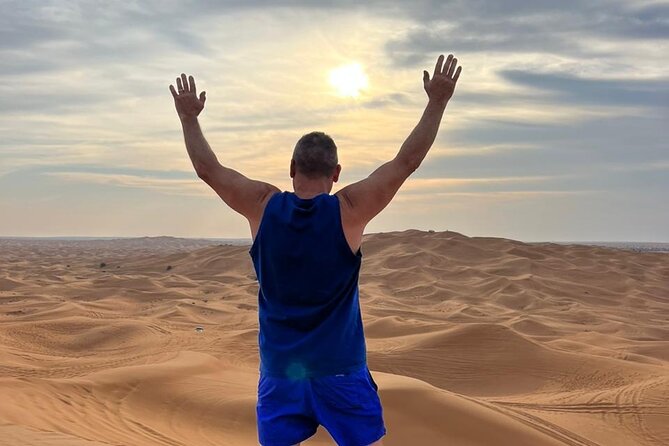 Dubai Red Dune Safari with Bedouin BBQ Dinner & Hotel Transfers - A short camel ride and Bedouin-style camp activities