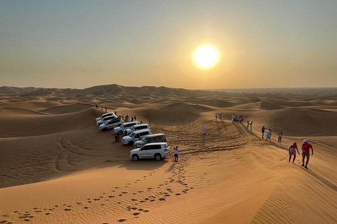 Dubai Red Dunes Afternoon Desert Safari with Camel Ride - Sandboarding adds a simple desert sport