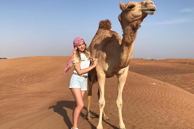 Dubai Red Dunes Desert Safari,ATV Quad Bike Camel Ride&BBQ Dinner - What the $75 Price Really Covers