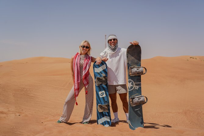 Dubai Red Dunes Desert Safari, Quad Bike, Camels at Al Khayma - Sandboarding is simple, photogenic fun