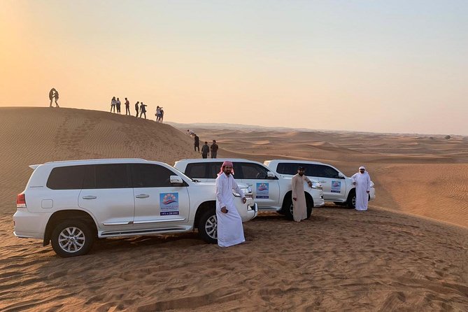 Dubai Red Dunes Desert Safari : Sandboarding, BBQ & Live Shows - Henna, Arabic dress, and the traditional touches