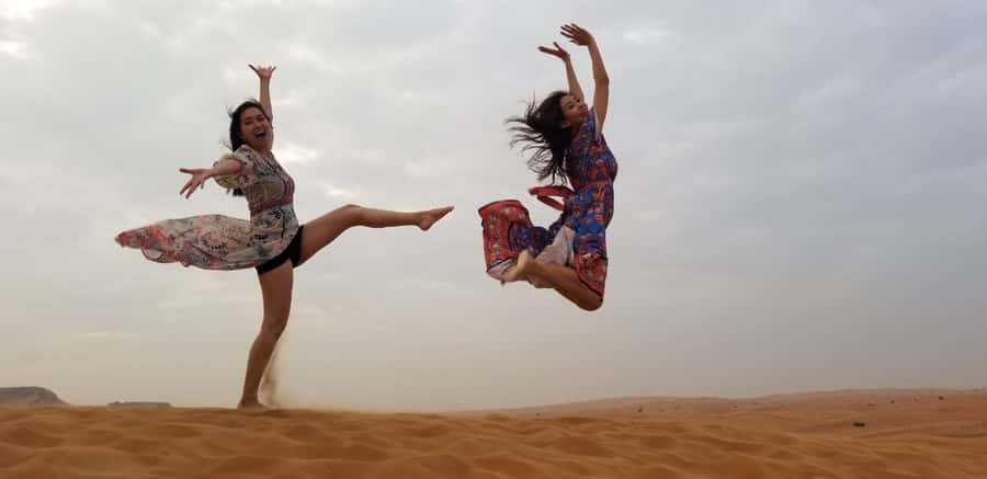 Dubai: Red Dunes Evening Quad Bike, Dune Blast with BBQ - Sandboarding and camel riding