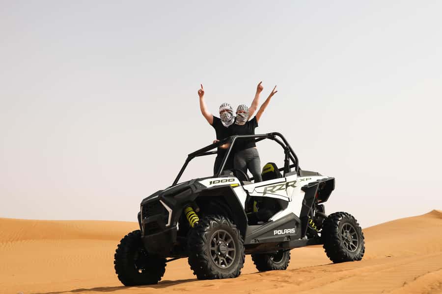 Dubai: Red Dunes Quad Bike, Dune Buggy, Camel & Refreshments - Sandboarding and the best photo pause