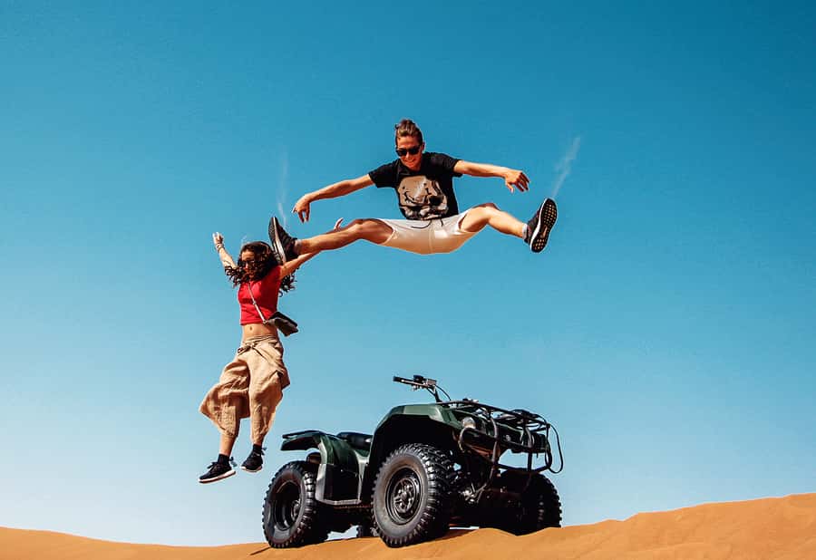 Dubai: Red Dunes Quad Bike with Sandboarding, Camels and BBQ - Quick takeaways