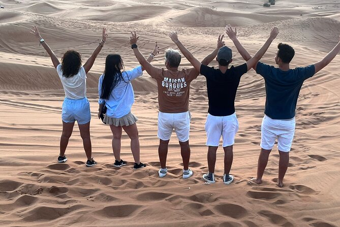 Dubai Red Dunes Safari, ATV, Camel ride, BBQ at Desert Camp - Camel riding and Arabic welcome at the camp