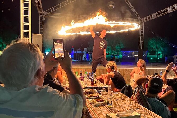 Dubai: Red Dunes, Sandsurf, Camel Ride, BBQ Dinner at Desert Camp - Sunset at camp and the evening program