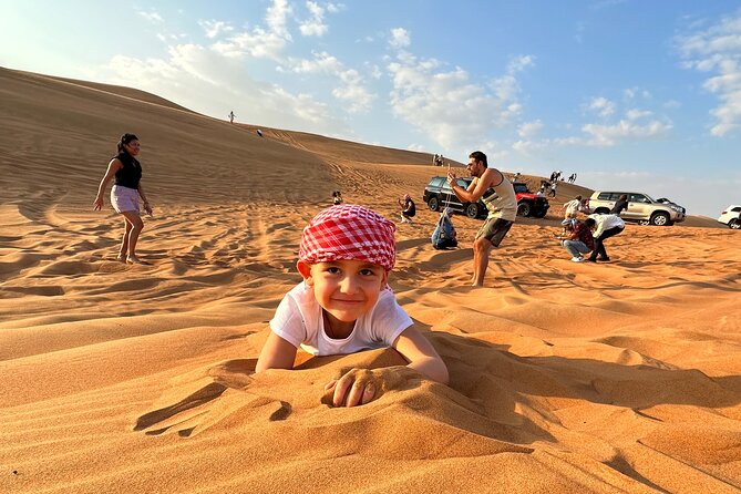 Dubai: Red Dunes, Sandsurf, Camel Ride, BBQ Dinner at Desert Camp - Sandboarding on the red dunes