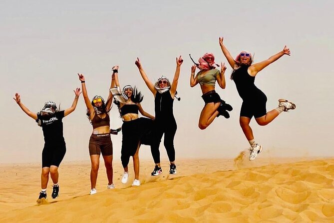 Dubai Red Dunes with Sandboarding, Camel Ride, Falcon & VIP Camp - A brief camel ride and a close look at falcons