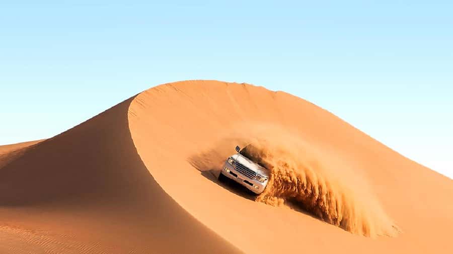 Dubai: Safari, Quad Bike, Camel Ride, and Buffet Dinner - Pickup and the 45-minute drive to Lahbab