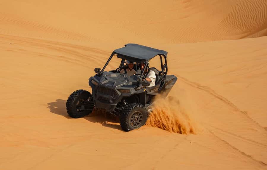 Dubai: Sandboarding, Camel Ride and Red Dune Bashing - Quad biking: worth adding, but read the risk details