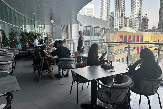 Dubai Secret Food Tours with Access to Burj Khalifa bar - Dubai Aquarium and Underwater Zoo from the outside