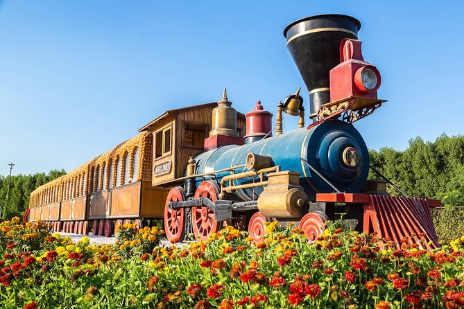 Dubai: Skip-The-Line Ticket to Dubai Miracle Garden - Lake Park brings water into the flower displays