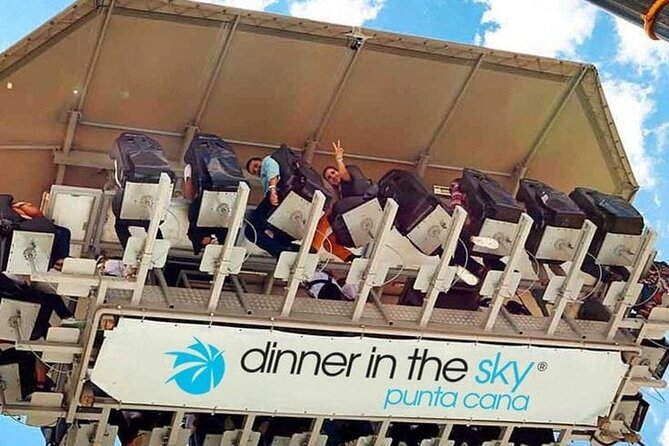 Dubai: Sky-High Dining Experience Dinner in the Sky - Getting strapped into the 50-meter platform