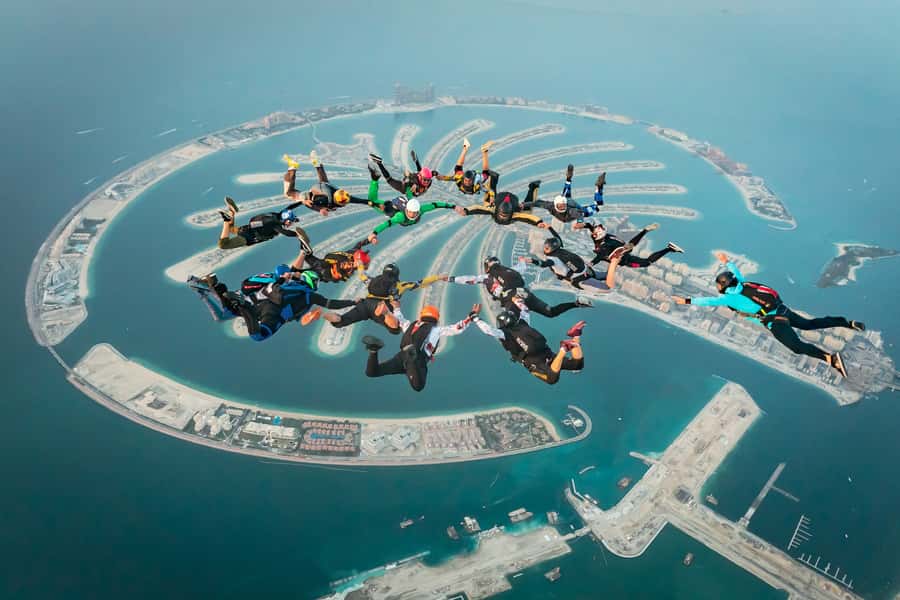 Dubai: Skydive at The Palm with Photos, Video & Yacht Tour - Four to five quiet minutes beneath the canopy