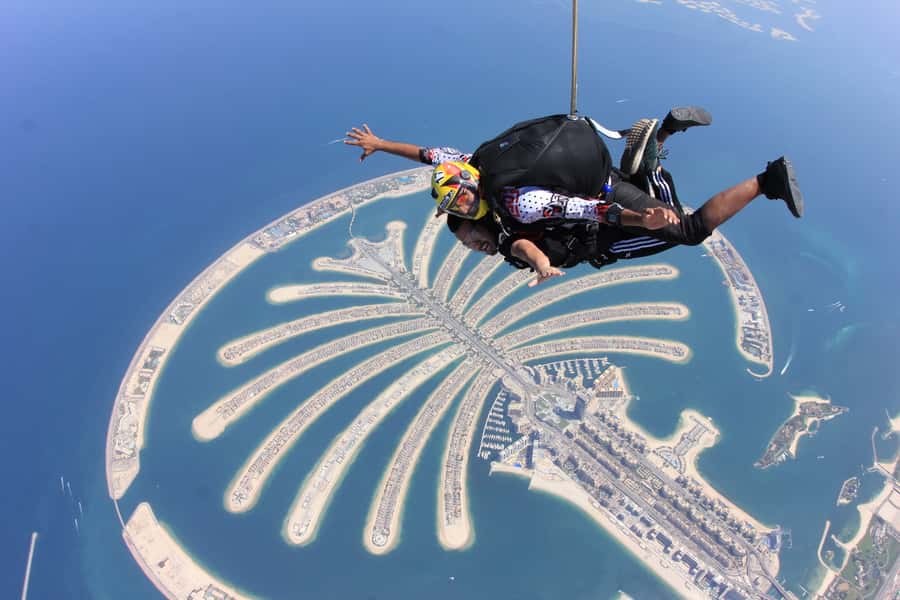 Dubai: Skydive at The Palm with Photos, Video & Yacht Tour - The 20-minute climb to 13,000 feet