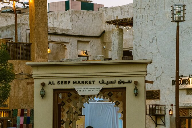 Dubai Souks, Museum Guided Tour with Boat Ride and Food Tastings - Walking through Al Fahidi’s lanes and wind towers