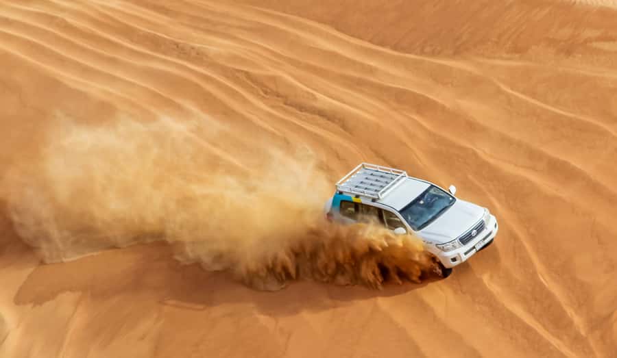 Dubai Sunrise Desert Camel Trek with Breakfast - Breakfast on low seating after the desert