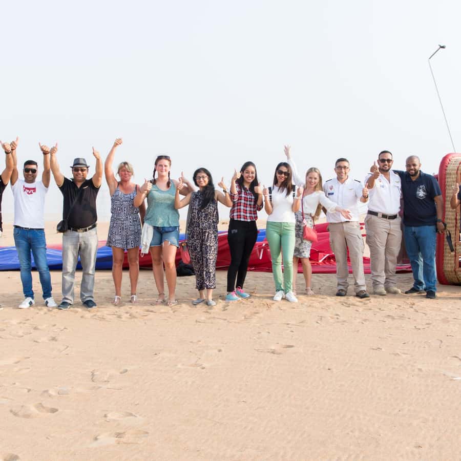 Dubai: Sunrise Hot Air Balloon Tour with E-Certificate - Landing, photographs, and the ride back