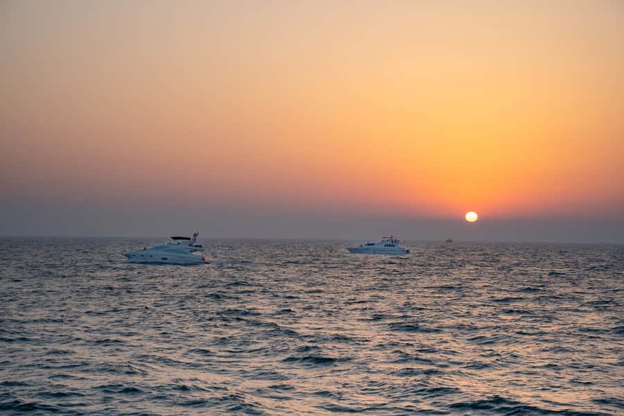 Dubai: Sunset & Night Cruise with Bites and Drinks - The return to Dubai Harbour after sunset
