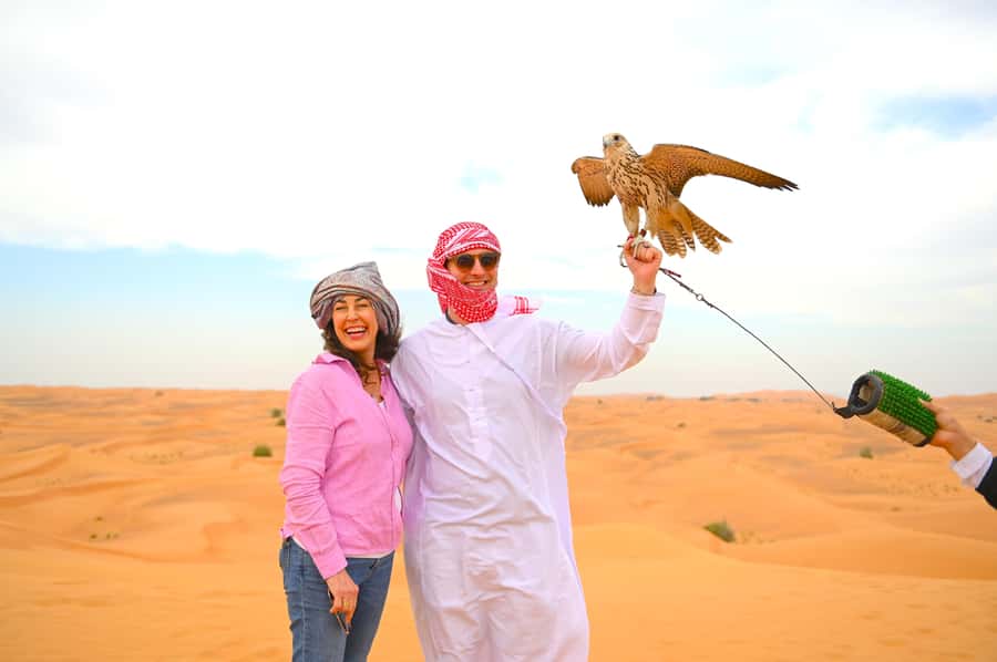 Dubai: Tour with BBQ Dinner, Camel Ride, & Traditional Show - Sunset photographs before the camp