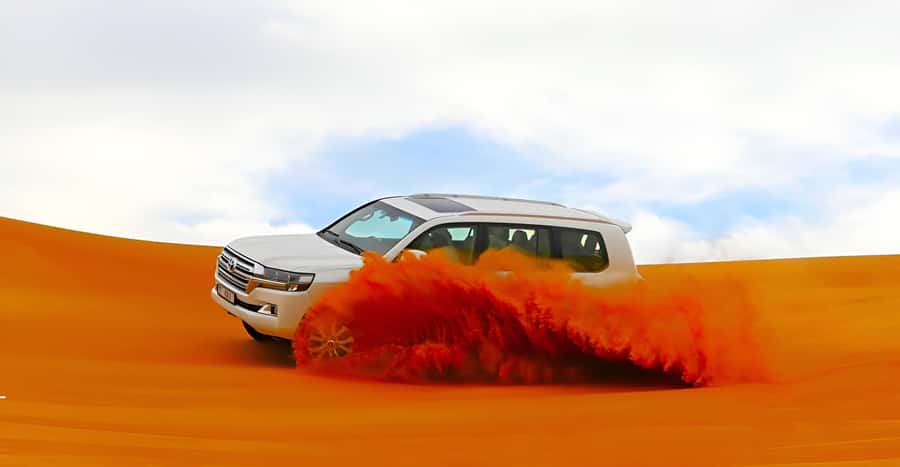 Dubai: Tour with BBQ Dinner, Camel Ride, & Traditional Show - Choosing between a gentle evening and dune bashing