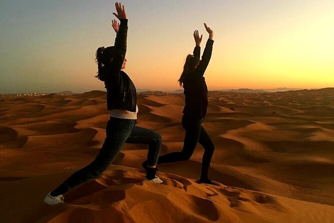 Dubai: Unique SUNRISE 4WD Red Dunes Safari - Sandboarding on the morning dunes