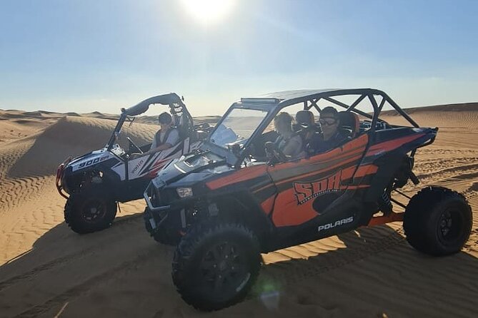 Dubai: Unique SUNSET Buggy Red Dunes Safari - Lahbab gives the tour its red-dune character