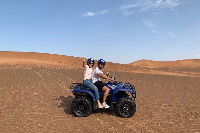 Dubai: Unique SUNSET Quad Bike Red Dunes Safari - Sunset is the best pause in the schedule