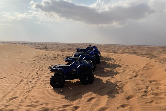 Dubai: Unique SUNSET Quad Bike Red Dunes Safari - Who will enjoy this most?